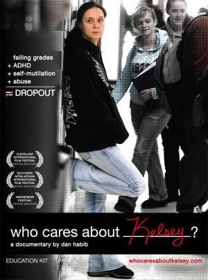 Image description: Who Cares About Kelsey DVD Cover. Photograph of light skinned girl with brown hair wearing a black sweatshirt and jeans, leaning up against a locker, turned to the side face looking to her right. Students in the hall in the background. Text reads Failing grades + ADHD + Self mutilation + Abuse white equal sign with red slash indicating “not equal”. Dropout. Festival Awards listed on left side of screen. "Who Cares About Kelsey? a documentary by Dan Habib. Education Kit.