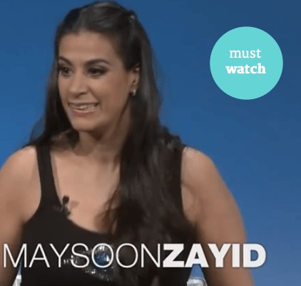 image description . Photograph of Maysoon Zayid, woman with long brown hair . She is smiling and wearing a black tank top. White text reads "MAYSOON ZAYID" . In upper right hand corner of image there is a turquoise circle with white text that reads "Must Watch"