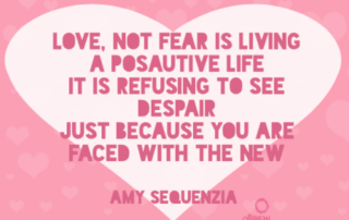 Image description: Pink square with tiny, interspersed light pink hearts. In the center there is a large white heart withe dark pink text that reads "Love, not fear is living a posAutive life It is refusing to see despair Just because you are faced with the new. Amy Sequenzia on Ollibean.