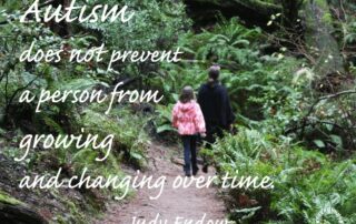 Photograph of the backs of an adult and a child walking on a path through the woods. "Autism does not prevent a person from growing and changing over time. Judy Endow" White Ollibean logo