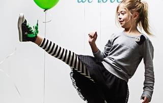 Photo of girl kicking with balloons in background. Text reads: RESOURCES we love. Ollibean logo.